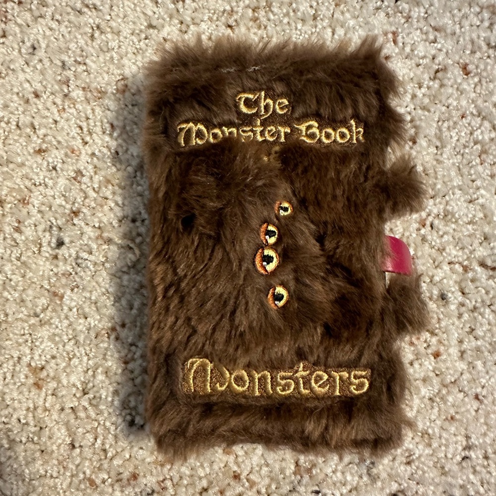 Monster book of Monsters Universal Studious IPhone s16 case